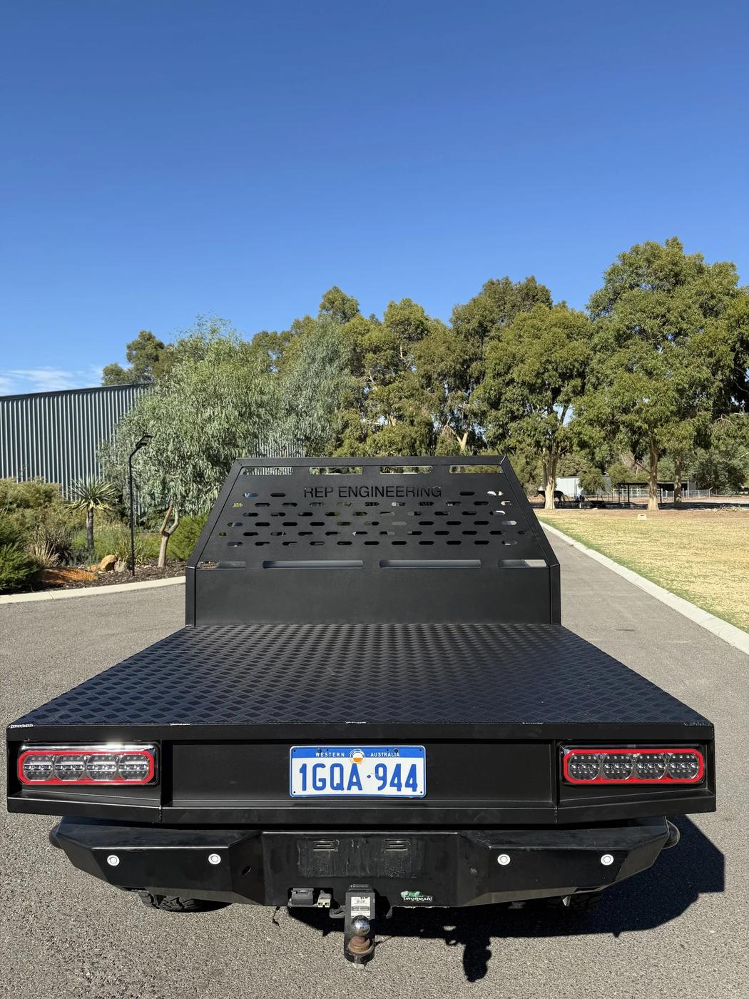 Full tail light panel on a black aluminium tray