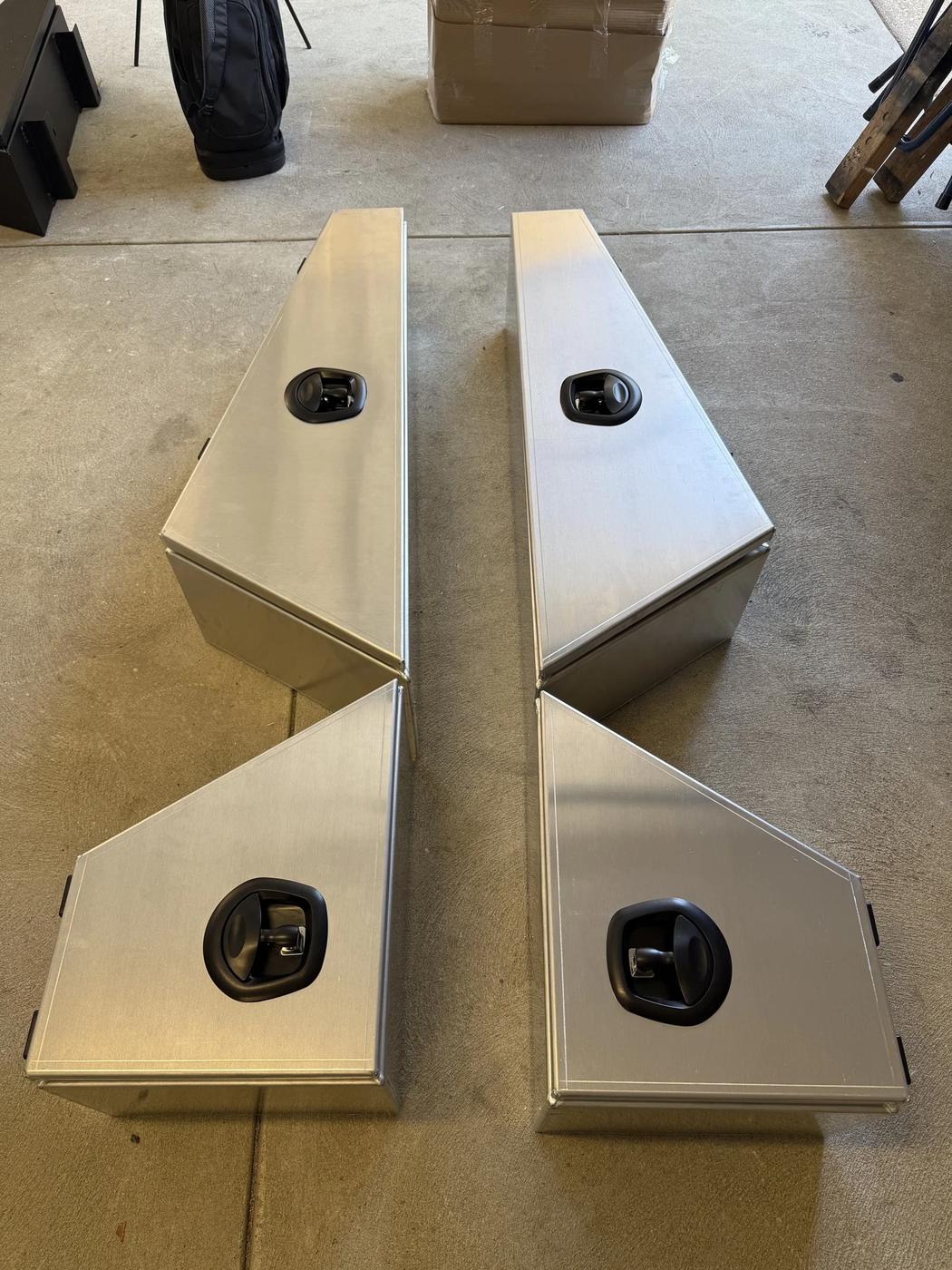 Underbody toolboxes with compression locks