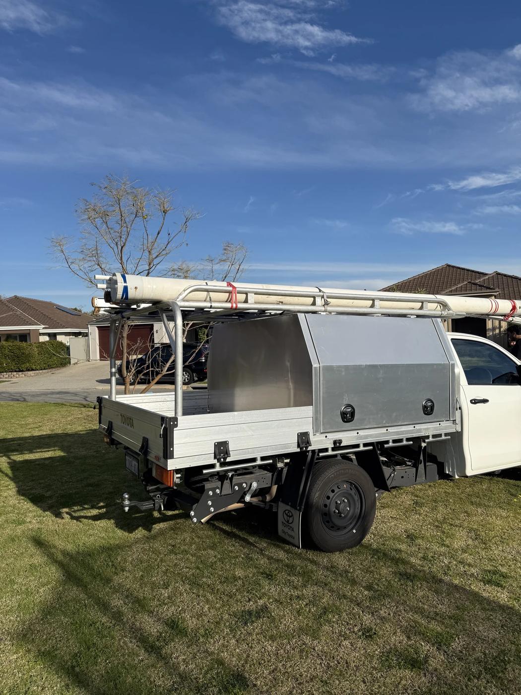Single cab Hilux trade canopy with pipe rack